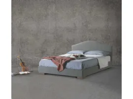 Letto in tessuto con testiera sagomata Cassiopea di Lettissimi