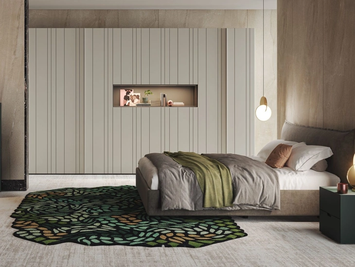 Letto in tessuto con testiera Piuma di Morassutti